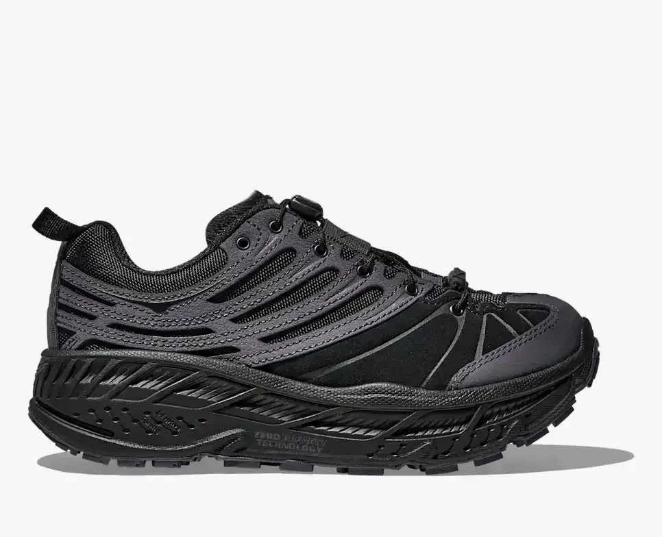 HOKA Elite Terrain System Stinson EVO OG Schwarz Media front view